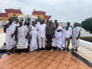 Samuel Koku Anyidoho (m) and members of the Ekumfi Odomna family