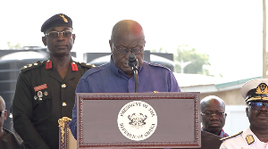 Nana Addo Dankwa Akufo-Addo and his personal Aide-De-Camp (standing behind)