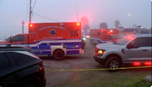Emergency crew respond near the scene of a plane crash in Galveston, Texas