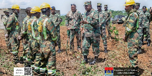 MILITARY CLEARS ROAD