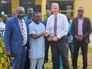 Dr. Dickson Adomako Kissi [1st from left], Rev John Ntim Fordjour with some personalities