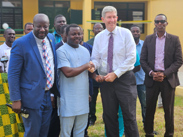 Dr. Dickson Adomako Kissi [1st from left], Rev John Ntim Fordjour with some personalities