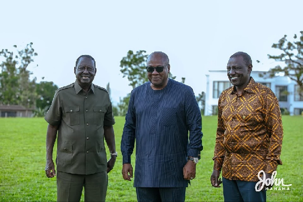 A photo of the late Raila Odinga (L) with John Dramani Mahama (M) and Kenya President Ruto