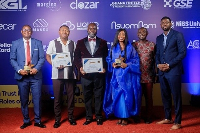 Chief Executive Officer Dr. John Obeng Apea and other officials of eTranzact