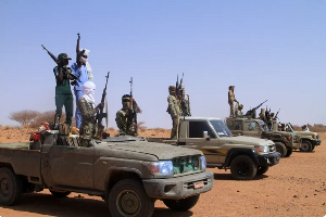 A group of armed defectors from the paramilitary Rapid Support Forces (RSF) arrive in vehicles