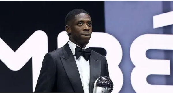 The Best Fifa Men's Player winner, Ousmane Dembele on stage with di trophy