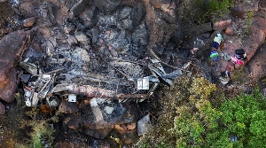 A view of the burnt remains of the bus that was taking Easter pilgrims from Botswana to Moria