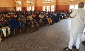 Alfred Nyantakyi (r) addressing pharmacy and OTC medicine sellers