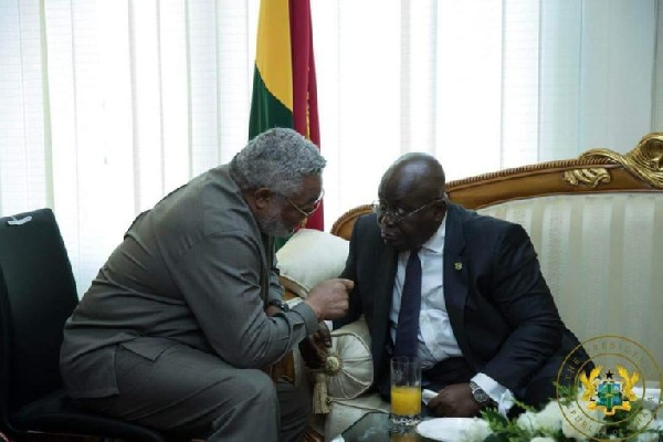 Former President Jerry Joh Rawlings with President Akufo-Addo in a coversation