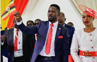Bobi Wine, and his wife, Barbara Itungo Kyagulanyi, attend a attend a ceremony for his nomination