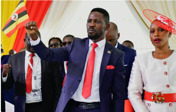 Bobi Wine, and his wife, Barbara Itungo Kyagulanyi, attend a attend a ceremony for his nomination