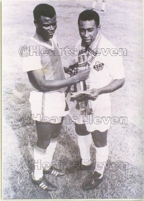 Pele with a Hearts of Oak player during his visit in 1969
