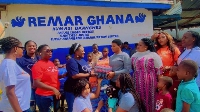Ewuraba Eesi gives the items to the orphanage home