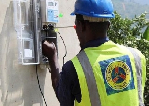 ECG staff working on a meter