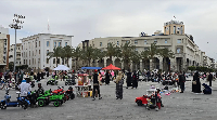 People walk in Martyr's square in Libya's capital Tripoli on May 10, 2025.