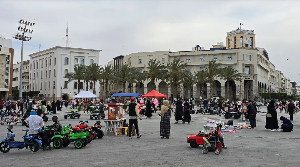 People walk in Martyr's square in Libya's capital Tripoli on May 10, 2025.