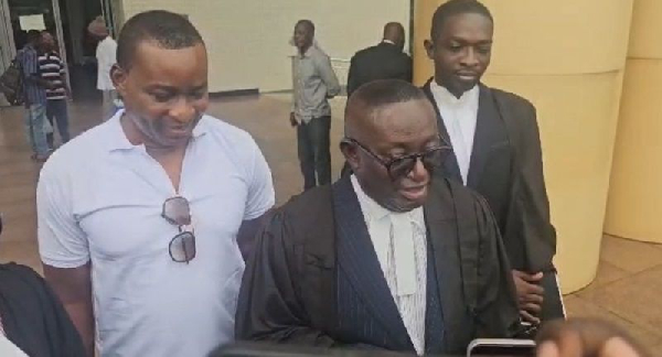 Andy Appiah-Kubi (in front) with Chairman Wontumi (L) at their last court appearance