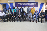 A photo of JICA and ECG officials