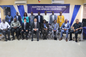 A photo of JICA and ECG officials