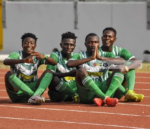 King Faisal players celebrating a goal