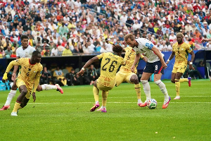 Black Stars defenders close down Harry Kane as the England captain attempts to control possession Black Stars defenders close down Harry Kane as the England captain attempts to control possession