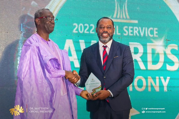 Energy Minister, Dr Matthew Opoku Prempeh receiving the honours