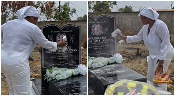 Gospel musician, Empress Gifty, seen sprinkling powder on her mother's grave