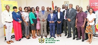 Leadership of NIA in a group photo with members of the Zambian Refugee Commission