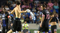 The pitch invader, carrying an Argentina shirt, hauled Lionel Messi to the ground
