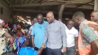 The NPP delegation of National Executives interacting with the affected market women