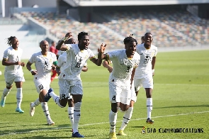 Black Stars players celebrating with Mohammed Salisu after he scored the against Switzerland