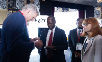 Emmanuel Armah-Kofi Buah (M) at the 32nd Africa Mining Indaba in Cape Town