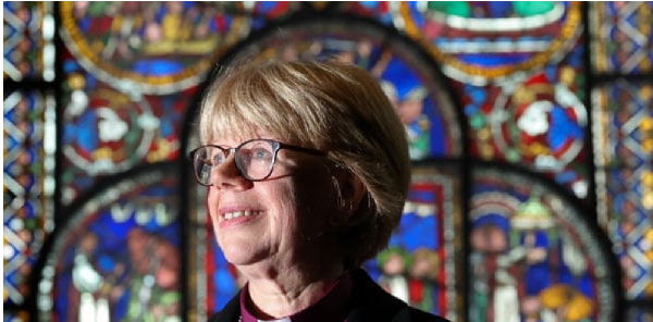 Archbishop of Canterbury-designate Sarah Mullally poses inside Canterbury Cathedral