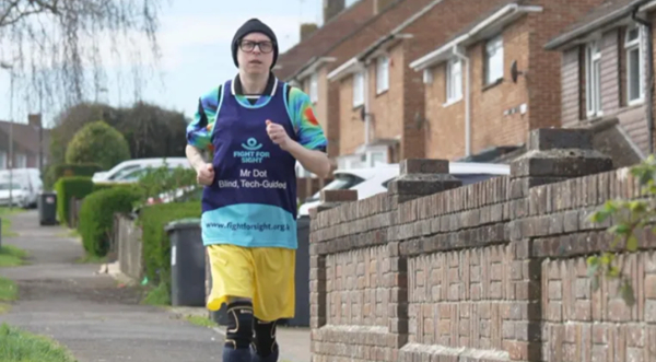 Clarke Reynolds ran the London Marathon with the help of a physical guide