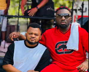 Ghanaian rapper Amerado (right)