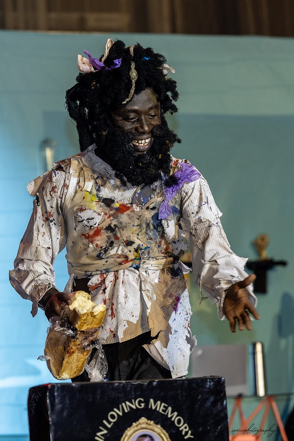 One of the characters performing on stage