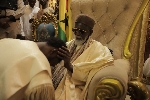 Nana Kwame Bediako receiving Chief Imam's blessing