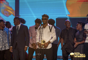 Mohammed Kudus holding the Footballer of the Year award