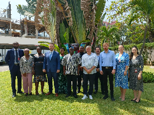 The minister with the EU team after the meeting