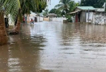 The floodwaters overwhelmed drainage systems, inundating homes, shops and major roads
