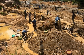 File Photo [Illegal miners at a site]
