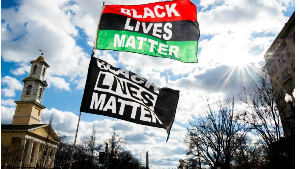 Black Lives Matter flags wave against the wind on Sunday, January 17, 2021
