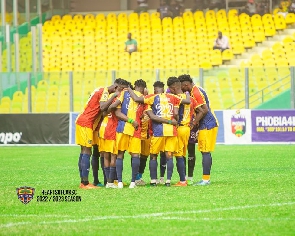 Accra Great Olympics players prepare for a league game