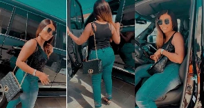 Deloris Frimpong Manso (Delay) flaunting a new SUV sometime in June 2022