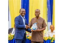 One of the beneficiaries receiving his award