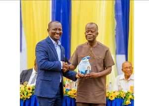 One of the beneficiaries receiving his award