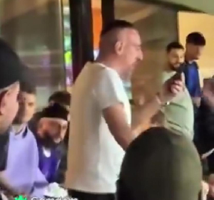 Fans are seen taunting Ribery during the game