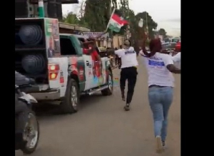 Some NPP supporters chasing the NPP pick-up truck