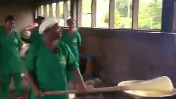 A screenshot of the video of caterers at Prempeh College singing the praising of Mahama's govt