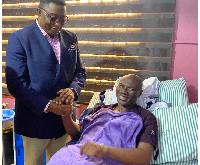 Elvis Afriyie-Ankrah shaking hands with Prophet Emmanuel Badu Kobi